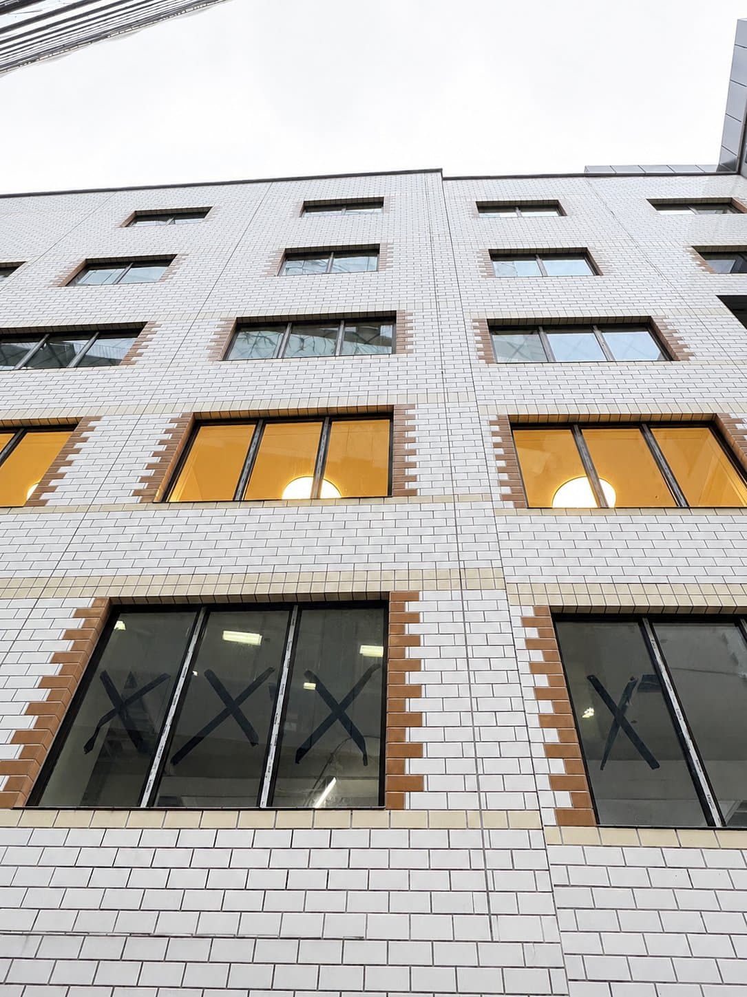 After: the full rear elevation restored, every glazed tile clean
